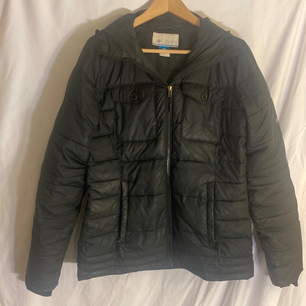 Woman’s hooded puffer style jacket size Med